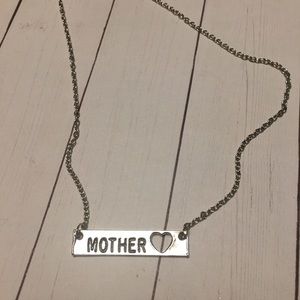 Mother jewelry bar necklace with heart cut out